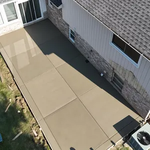 Concrete side yard slab along a home