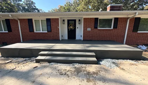 Finished concrete porch with three steps