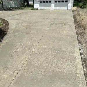 Broom-finish concrete driveway extension
