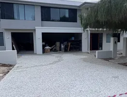 Driveway base graded and compacted before forms