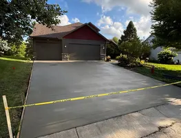 Driveway formed and taped off after the pour