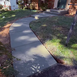 Front yard concrete walkway to the porch