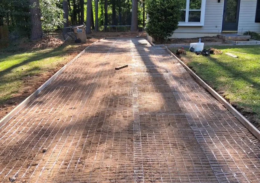 Long Garden Walkway on a Wooded Lot in Exeter