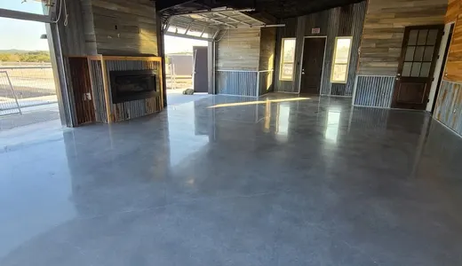 Stained concrete floor in a converted shop