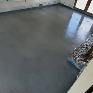 Smooth gray stained concrete in a new addition