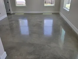 Sealed stained concrete floor with high gloss