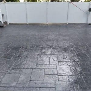 Dark gray stamped stone pattern after sealing