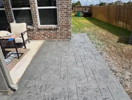 Stamped concrete side yard walkway