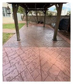 Stamped concrete patio under a pergola